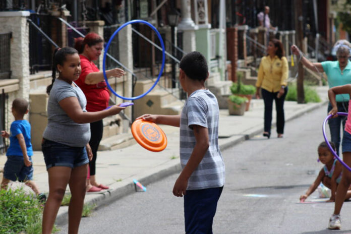 Families-play-on-a-North-Philadelphia-Playstreet-in-a-2018-photo-Philadelphia-Parks-and-Rec-768x512-1