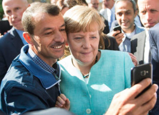 ACNUR premia a Merkel por su acogida a refugiados sirios