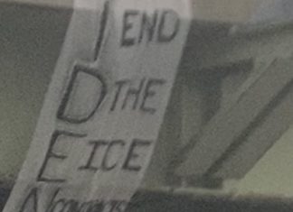 Activists Welcome President Biden To Philadelphia With A Banner, “Biden End The ICE Contracts”