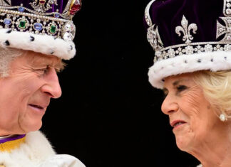 King Charles III crowned with regal pomp, cheers and shrugs