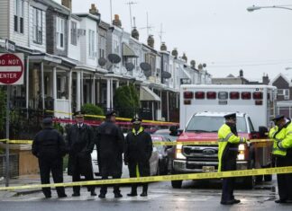 2 sought in Philadelphia shooting that killed 3, wounded 1