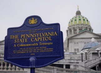 Impasse on funding for Pennsylvania universities could mean higher tuition FILE - An historical marker at the Pennsylvania Capitol in Harrisburg, Pa., is seen on Feb. 21, 2023. A partisan dispute about funding for three of Pennsylvania’s state-related universities may mean higher tuition for in-state students as a budget impasse continues further into the summer. The state government approached two weeks without full spending authority on Tuesday, July 11, while loose ends remained untied. (AP Photo/Matt Rourke, File)