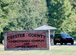 Fugitive killer eludes Pennsylvania police for eighth day as wary residents keep a watchful eye