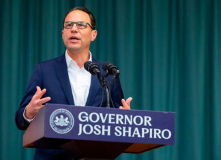 Pennsylvania governor’s office settles for $295K a former staffer’s claim senior aide harassed her