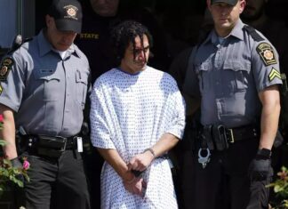 Escaped murderer charged with burglary and theft while on the run for 2 weeks