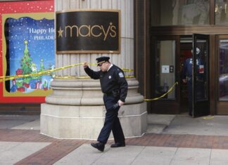 Man charged with murder in Philadelphia store stabbing that killed security guard, wounded another