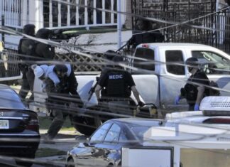 Suspect is barricaded in New Jersey home after killing 3 people in Philadelphia suburb, police say barricaded