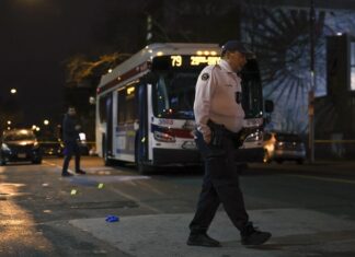Suspected shooter, driver are in custody in Philadelphia bus stop shooting that injured 8 teens driver