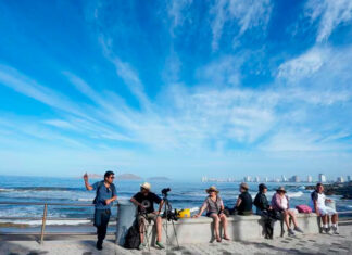 The Latest | Biden encourages Americans to protect their eyes biden