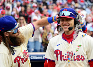 Upon further review, Phillies use overturned third out on replay to rally past Braves 5-4 Phillies