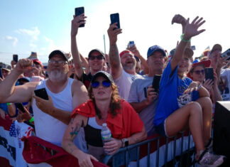 ‘One screen, two movies’: Conflicting conspiracy theories emerge from the Trump rally shooting Trump