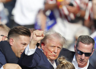 Shooting at Trump rally is being investigated as assassination attempt, AP sources say shooting