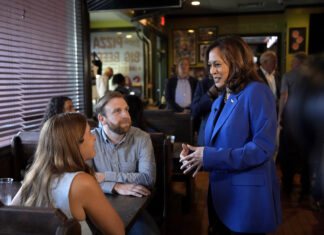 Harris and Walz make small-town stops and campaign phone calls on Pennsylvania bus tour before DNC