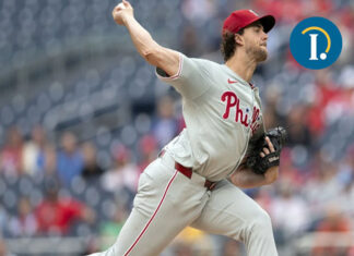 Nola earns 14th victory as NL East champion Phillies beat the Nationals 6-3 in regular-season finale Phillies