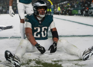 Barkley runs for 78- and 62-yard TDs in the snow and Eagles top Rams 28-22 to head to NFC title game Eagles