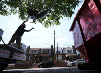 Philadelphia aims to control trash pileups ahead of holiday weekend as city workers strike continues