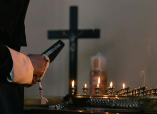 A look at the largest clergy abuse settlements reached by Catholic organizations in the US