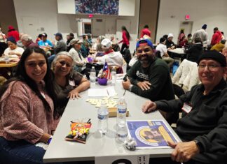 Taller Puertorriqueño launches domino tournament that brings generations together dominó