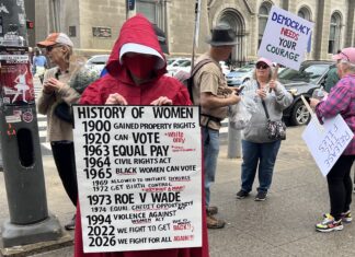 A red cloak in the crowd: Philadelphia marches for International Women’s Day