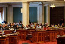 Families and local leaders filled City Hall as Philadelphia moved the package one step closer to a final vote