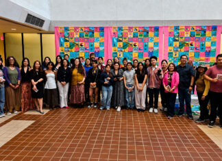 Migrating Lives” en un mural colaborativo comunitario en Filadelfia