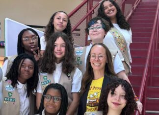 Eight Girl Scouts from Hunting Park troop warn their Silver Award